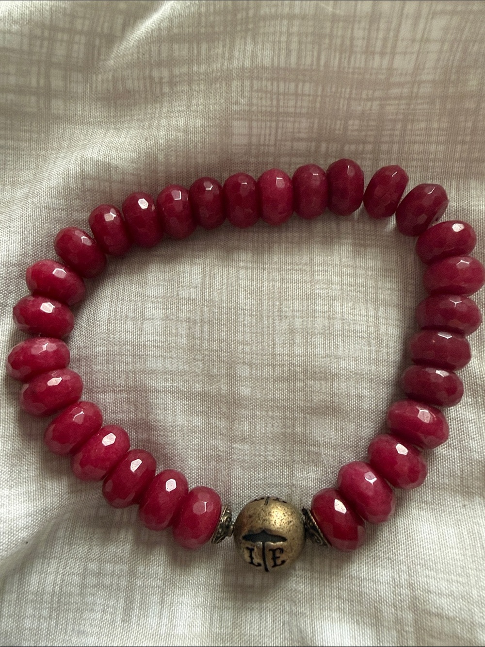 Faceted Raspberry Pink Bead Stretch Bracelet with Antiqued Gold Accent